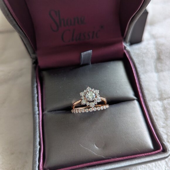 0.53 ct. diamond engagement ring with diamond halo set in a rose gold band